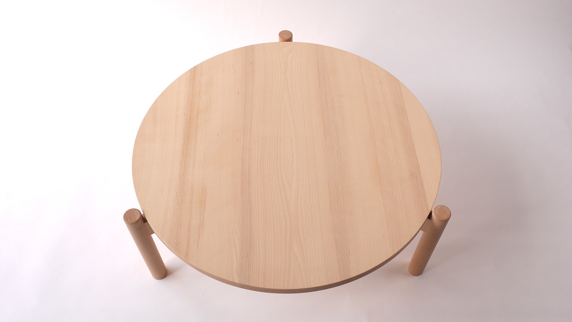 Table basse ronde en hêtre sur tripode vue plateau